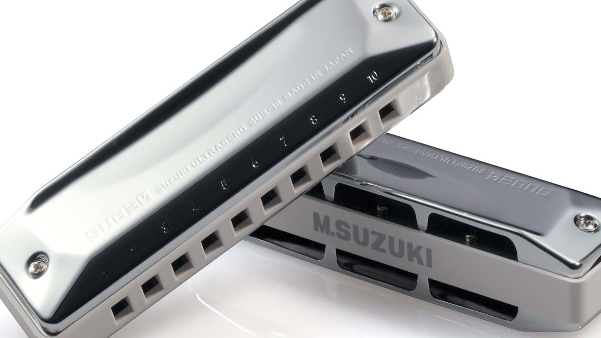 Suzuki harmonicas, melodions, recorders, reed plates and spare parts